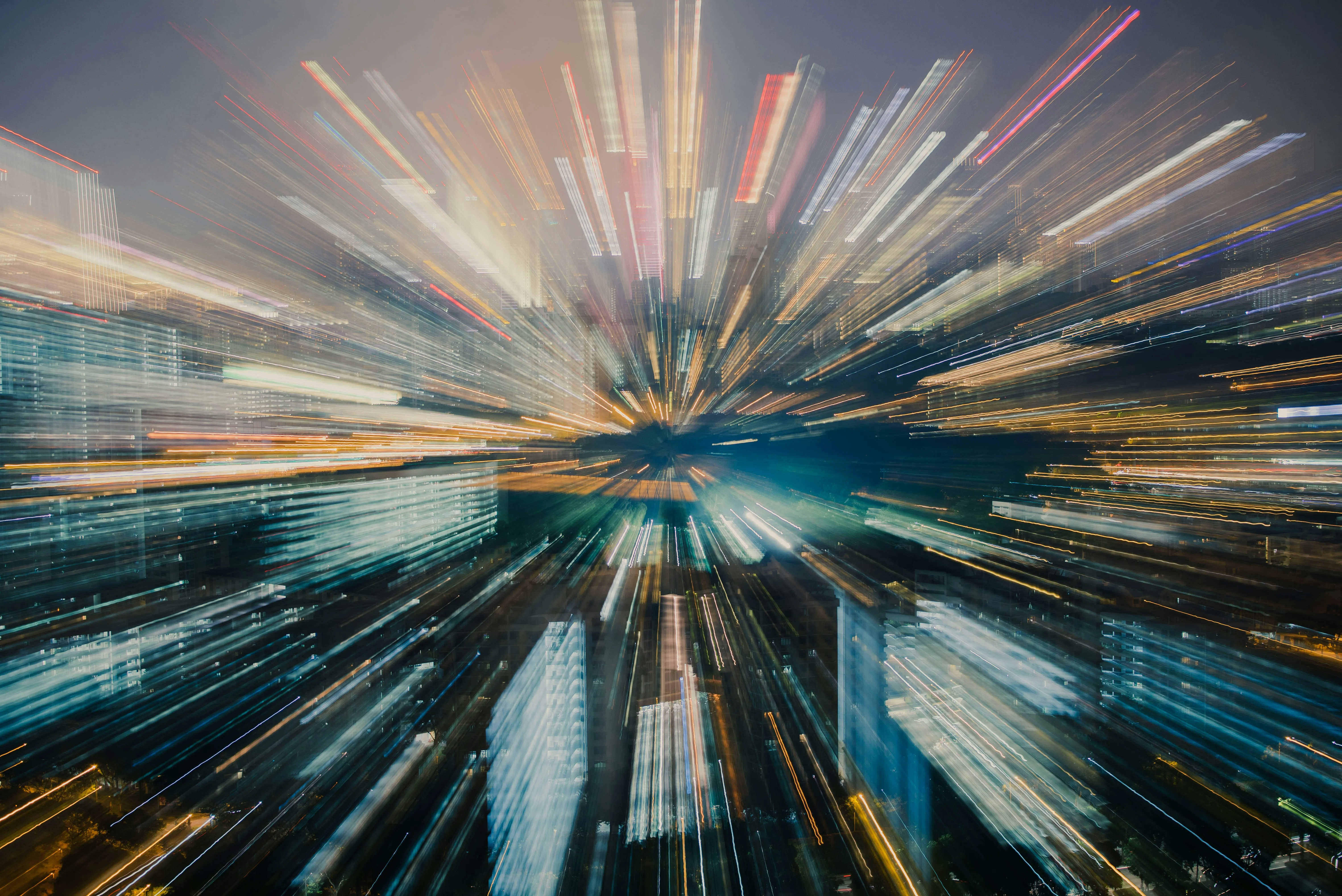 A shot of beams of light created by zooming a camera while the shutter is open.